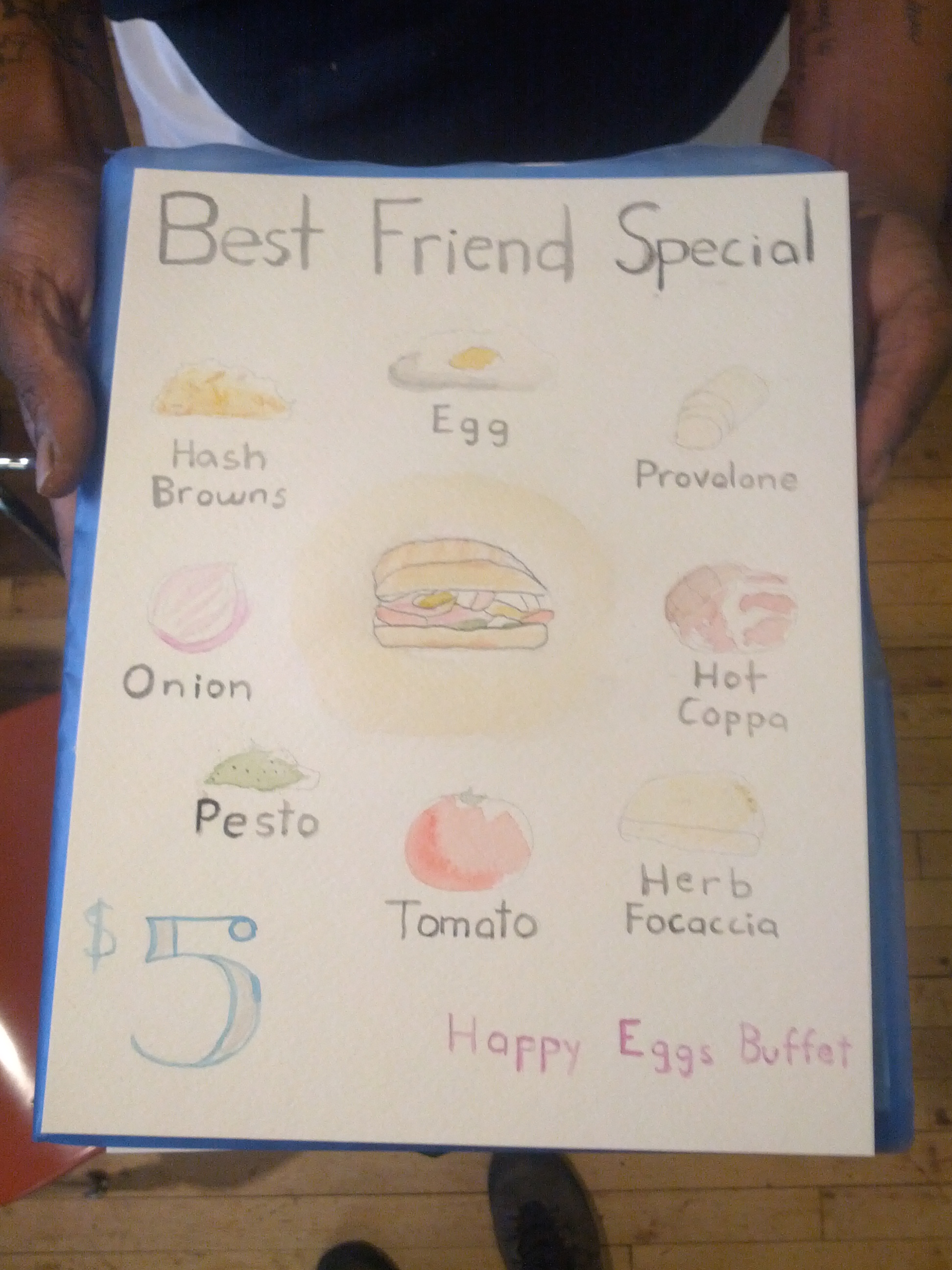 Best Friend Special: egg, provolone, hot coppa, herb focaccia, tomato, pesto, onion, hash browns. $5. Happy Eggs Buffet. (Each ingreditent was painted in watercolor.)