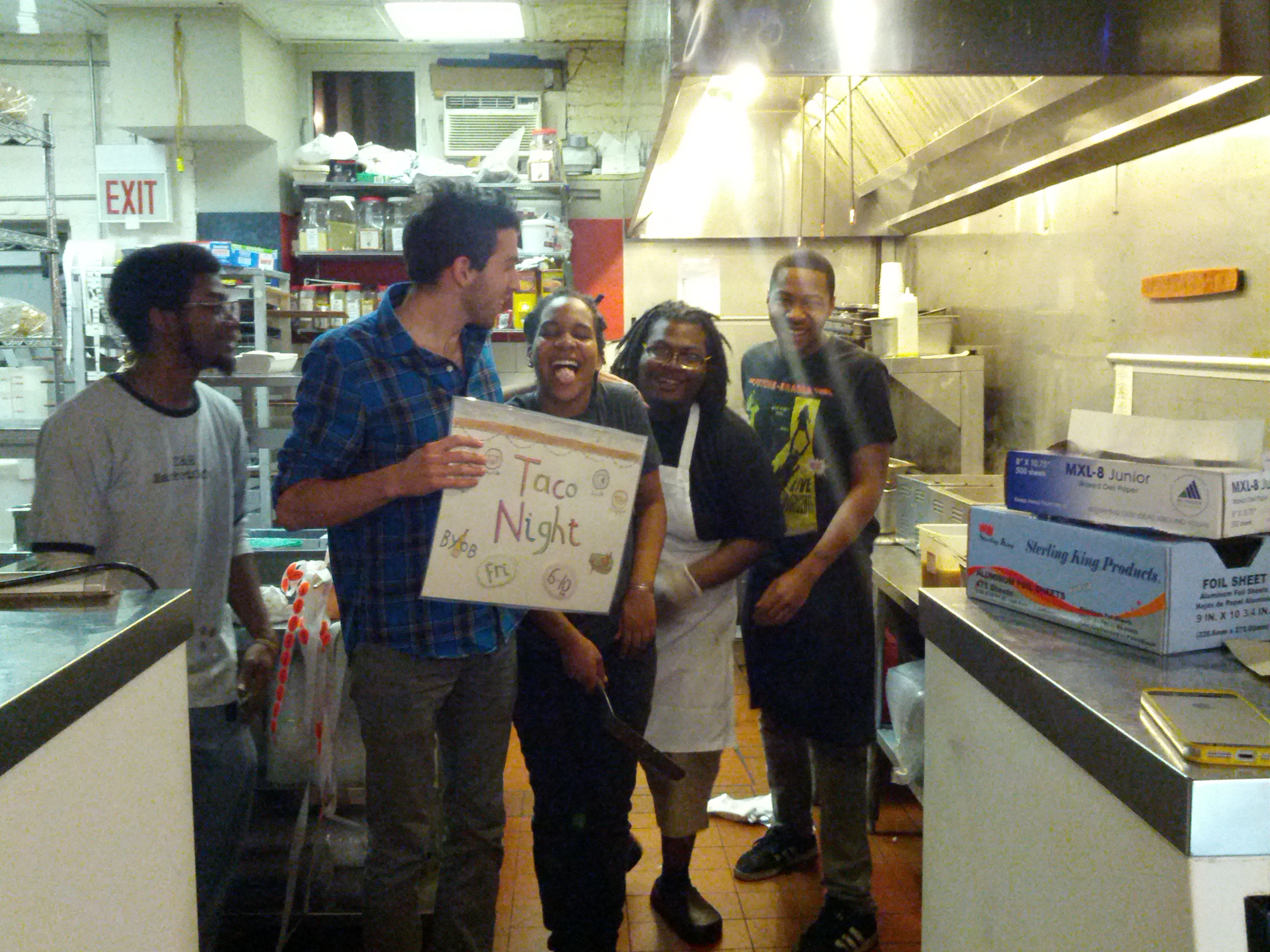 Me in the Z&H kitchen with some of the Taco Night crew. I'm holding a sign I made for Taco Night.